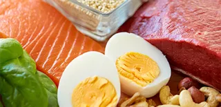 Photo of various types of protein including chicken, fish, beef, and eggs